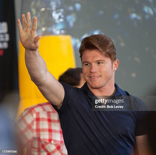 Canelo Alvarez speaks during a press conference to discuss his Super Welterweight World Championship fight with Floyd Mayweather July 1, 2013 at...