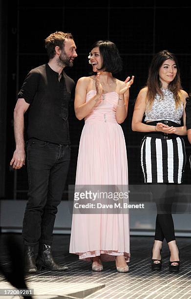 Guest, Natasha Khan of Bat For Lashes and Alyusha Chagrin of the Boxettes bow on stage at 'A Curious Night at the Theatre', a charity gala evening to...