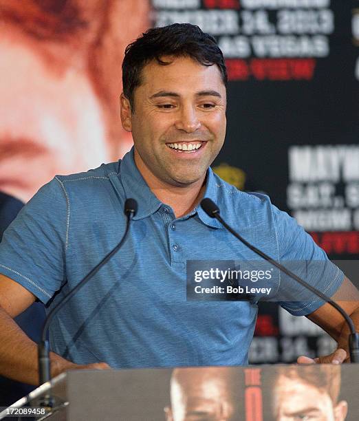 Oscar De La Hoya speaks during a press conference along with Canelo Alvarez and Floyd Mayweather Park to discuss their Super Welterweight World...