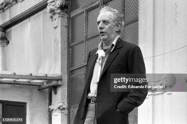 Italian playwright and actor Dario Fo performs onstage, in front of the Palazzina del Liberty, Milan, Italy, May 1, 1977.