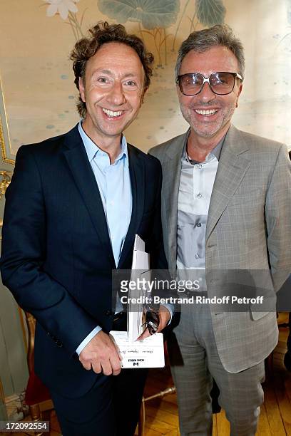 Stephane Bern and Artistic Director of Guerlain Olivier Echaudemaison attend the Alexis Mabille show as part of Paris Fashion Week Haute-Couture...