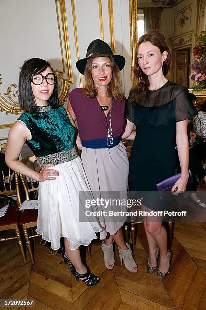 Group "Les Brigittes" members Sylvie Hoarau and Aurelie Saada with Audrey Marnay attend the Alexis Mabille show as part of Paris Fashion Week...