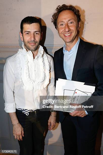 Fashion designer Alexis Mabille and Stephane Bern attend the Alexis Mabille show as part of Paris Fashion Week Haute-Couture Fall/Winter 2013-2014 at...