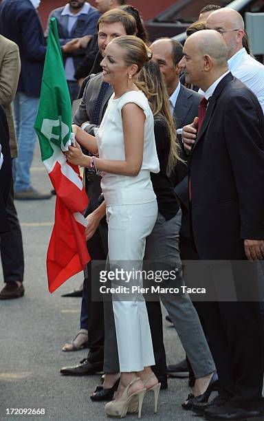 Francesca Pascale the girlfriend of former Italian prime minister Silvio Berlusconi and leader of People of freedom political party hold in her hands...