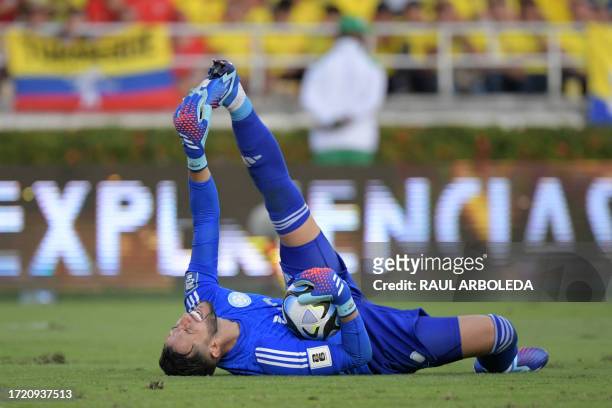 Colombia's goalkeeper Camilo Vargas gestures on the ground during the 2026 FIFA World Cup South American qualification football match between...