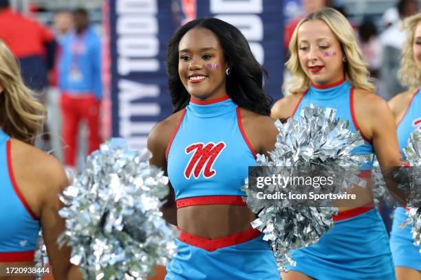 An Ole Miss Rebels cheerleader during the game between the Ole Miss Rebels and the Arkansas Razorbacks on October 7, 2023 at Vaught-Hemingway Stadium...