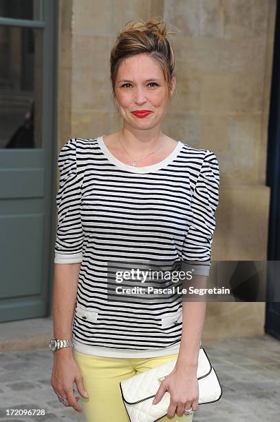 Lilou Fogli attends the Alexis Mabille show as part of Paris Fashion Week Haute-Couture Fall/Winter 2013-2014 at Hotel dEvreux on July 1, 2013 in...