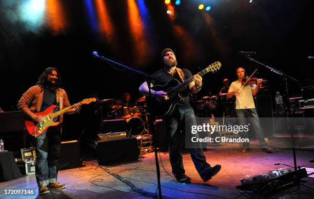 Clay Cook, Chris Fryar, Zac Brown, Daniel De Los Reyes and Jimmy De Martini of the Zac Brown Band perform on stage at O2 Shepherd's Bush Empire on...