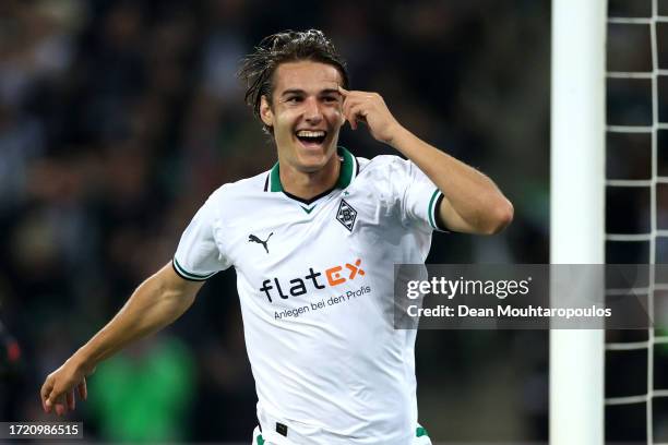 Florian Neuhaus of Borussia Moenchengladbach celebrates after scoring the team's first goal during the Bundesliga match between Borussia...