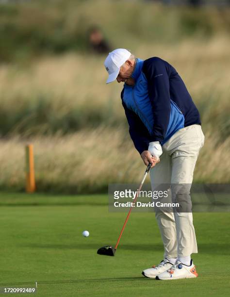 John Elway of The United States the former San Francisco 49ers quarterback plays a shot during Day Two of the Alfred Dunhill Links Championship on...