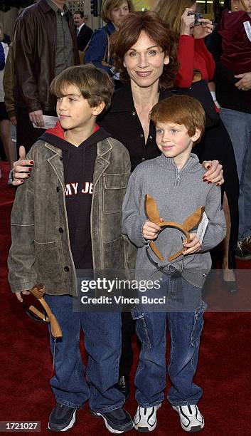 Actress Marilu Henner and sons Nick and Joe attend the premiere of the film "Kangaroo Jack" at Grauman's Chinese Theatre on January 11, 2003 in...