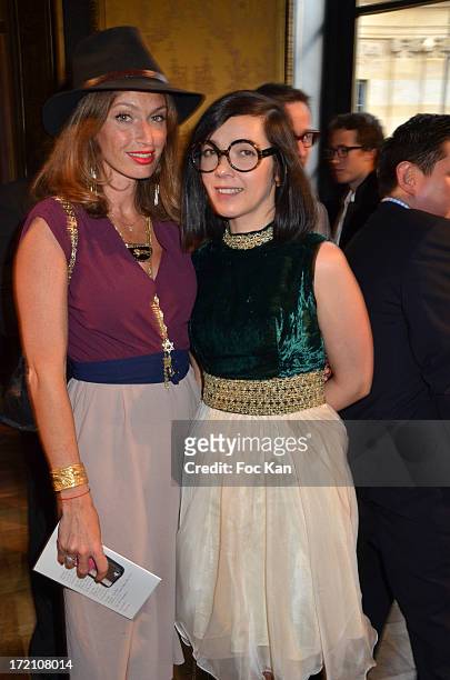 Sylvie Hoarau and Aurelie Saada from Les Brigitte band attend the Alexis Mabille show during Paris Fashion Week Haute-Couture F/W 2013-2014 at the...