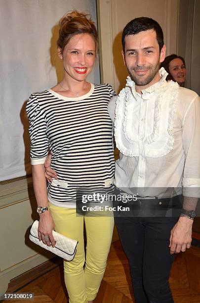 Actress Lilou Fogli and Alexis Mabille attend the Alexis Mabille show during Paris Fashion Week Haute-Couture F/W 2013-2014 at the Hotel d' Evreux on...