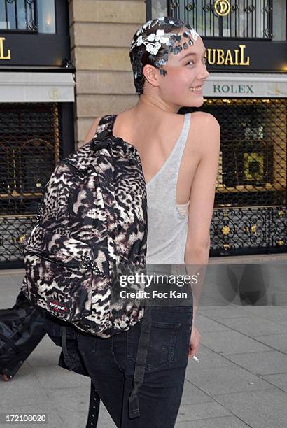 Model Yumi Lambert leaves the Alexis Mabille show during Paris Fashion Week Haute-Couture F/W 2013-2014 at the Hotel d' Evreux on July 1, 2013 in...