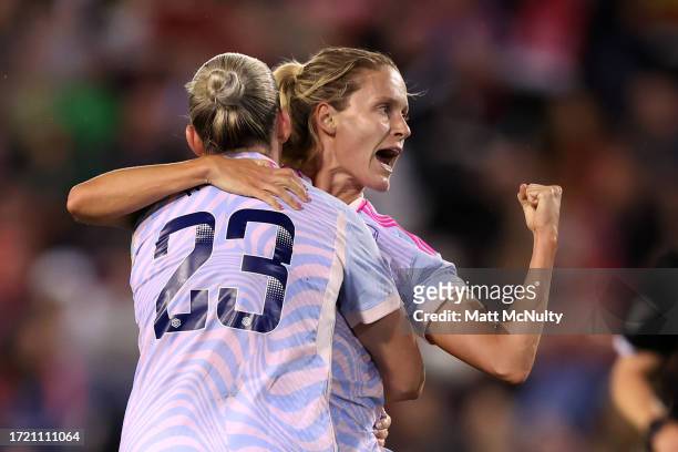 Cloe Lacasse of Arsenal celebrates with Alessia Russoafter scoring the team's second goal during the Barclays Women´s Super League match between...