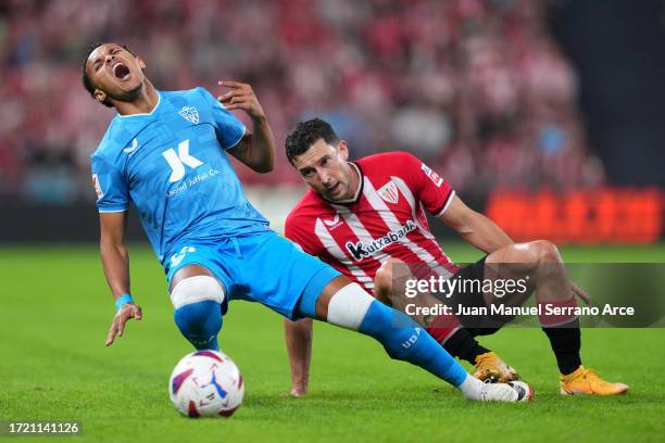 Lazaro of UD Almeria battles is challenged by Oscar de Marcos of Athletic Club during the LaLiga EA Sports match between Athletic Bilbao and UD...