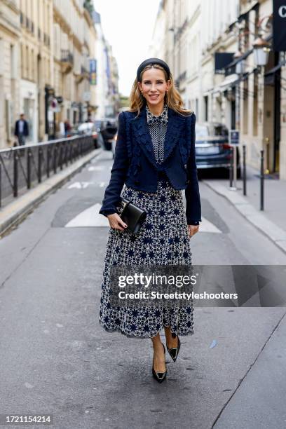 Influencer Alexandra Lapp, wearing a Maison Common short boucle jacket with ribbon details in navy, a Maison Common long sleeve blouse with plastron...