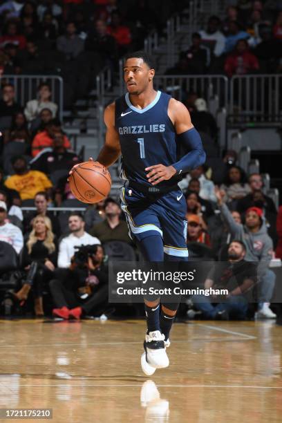 Shaquille Harrison of the Memphis Grizzlies dribbles the ball during the preseason game on October 12, 2023 at State Farm Arena in Atlanta, Georgia....