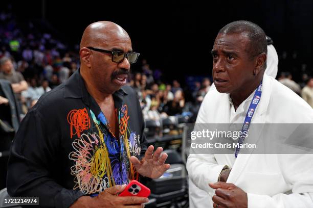 Legend Ahmad Rashad talks to Steve Harvey before the Dallas Mavericks game against the Minnesota Timberwolves as part of 2023 NBA Global Games Abu...