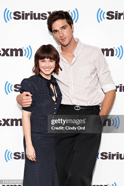 Cailee Spaeny and Jacob Elordi pose for a photo during SiriusXM's Town Hall with the cast of 'Priscilla' hosted by Andy Cohen at SiriusXM Studios on...