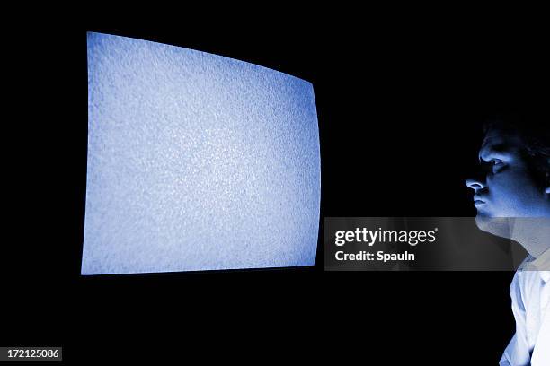 tv addict - glowing tv stock pictures, royalty-free photos & images