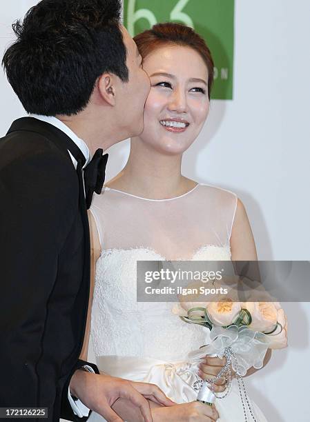 Do Kyung-Wan and Jang Yoon-Jung pose for photographs before their Wedding at 63 building convention center on June 28, 2013 in Seoul, South Korea.