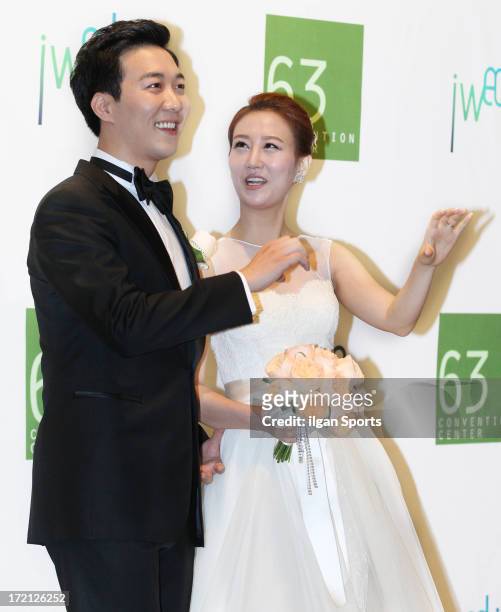Do Kyung-Wan and Jang Yoon-Jung pose for photographs before their Wedding at 63 building convention center on June 28, 2013 in Seoul, South Korea.