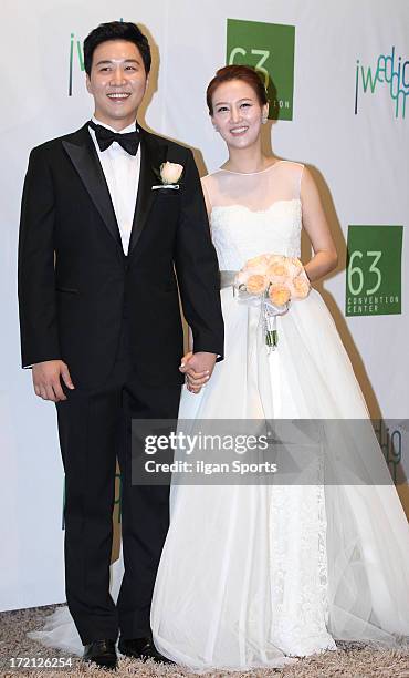 Do Kyung-Wan and Jang Yoon-Jung pose for photographs before their Wedding at 63 building convention center on June 28, 2013 in Seoul, South Korea.