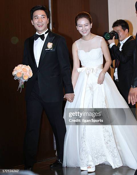 Do Kyung-Wan and Jang Yoon-Jung pose for photographs before their Wedding at 63 building convention center on June 28, 2013 in Seoul, South Korea.