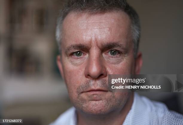 David Parfett poses at his home in Maidenhead, United Kingdom, on September 22, 2023. At least a hundred victims and over 1,200 packages sent to some...