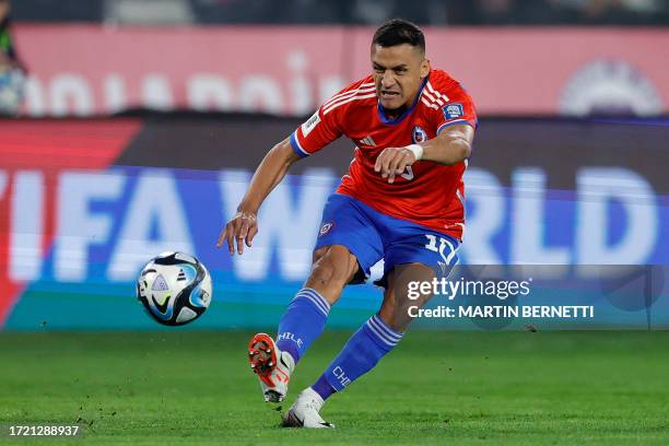 Chile's forward Alexis Sanchez shoots the ball during the 2026 FIFA World Cup South American qualification football match between Chile and Peru at...