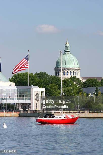 sailboat moored off capitol building in annapolis - annapolis stock pictures, royalty-free photos & images
