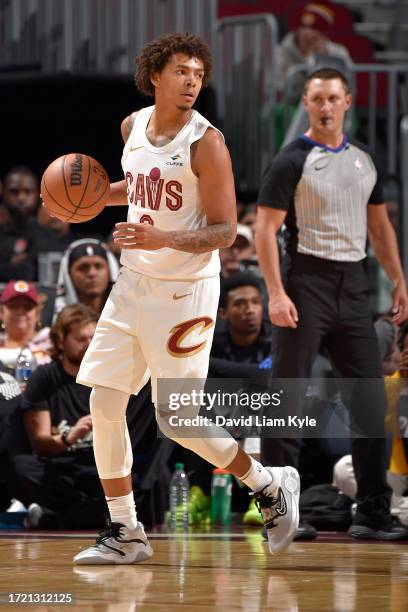 Craig Porter of the Cleveland Cavaliers dribbles the ball during the game against the Orlando Magic on October 12, 2023 at Rocket Mortgage FieldHouse...