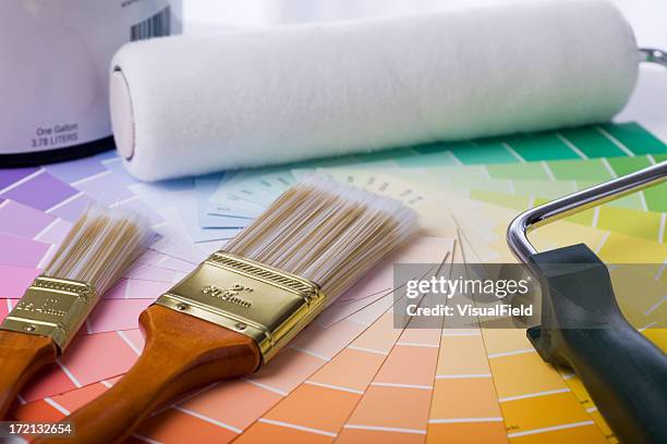preparing to paint - paint roller stock pictures, royalty-free photos & images
