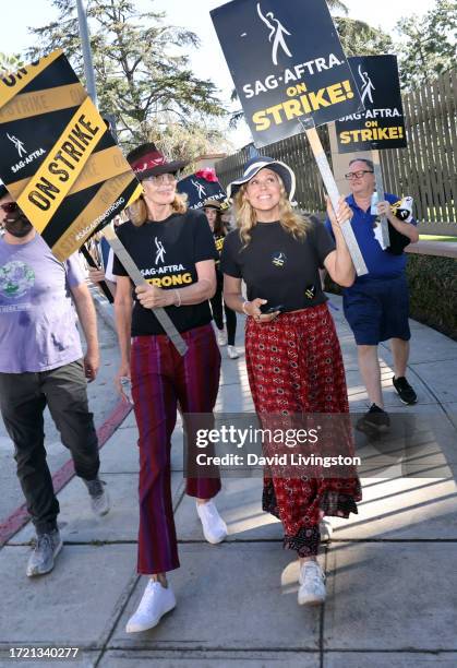 Allison Janney and Mary McCormack join the picket line outside Warner Bros. Studios on October 06, 2023 in Burbank, California. The WGA has reached a...