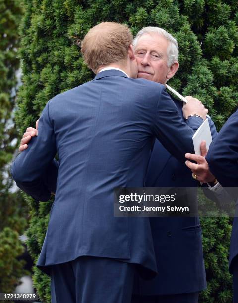 Prince Harry Kisses To Prince Charles At The Funeral Of Hugh Cutsem In Brentwood, England..They Bid Farewell To Charles'S Close Friend And Confidant...