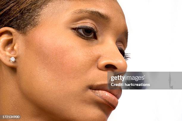 woman of color - diamond stud earring stock pictures, royalty-free photos & images
