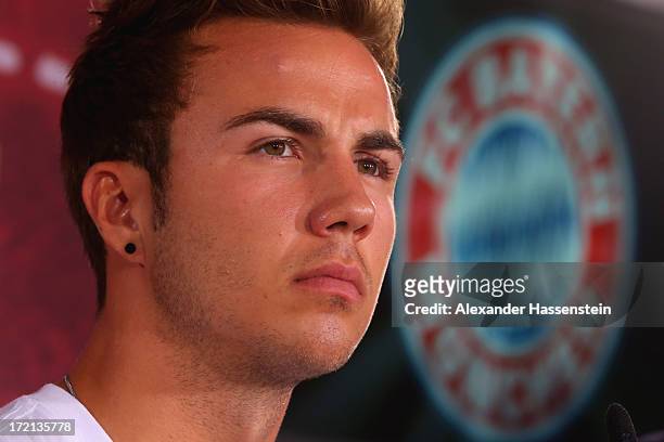 Mario Goetze of FC Bayern Muenchen looks on during a press conference at Bayern Muenchens headquarter Saebener Strasse on July 2, 2013 in Munich,...
