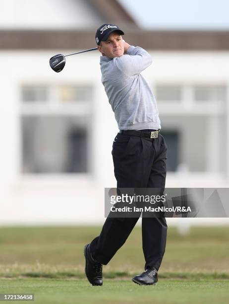 Michael Stewart of Troon Welbeck tee's off from the first tee during the Open Championship Local Qualifying at Dunbar Golf Course on July 02, 2013 in...