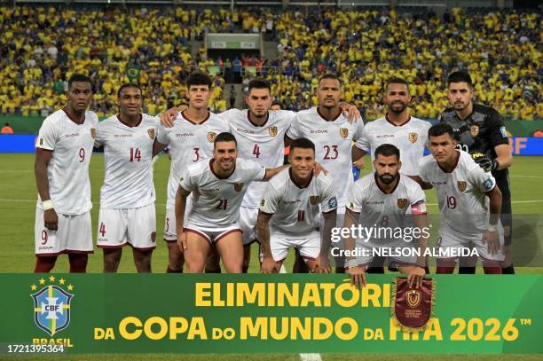 Venezuela's players pose for a team photo during the 2026 FIFA World Cup South American qualification football match between Brazil and Venezuela at...