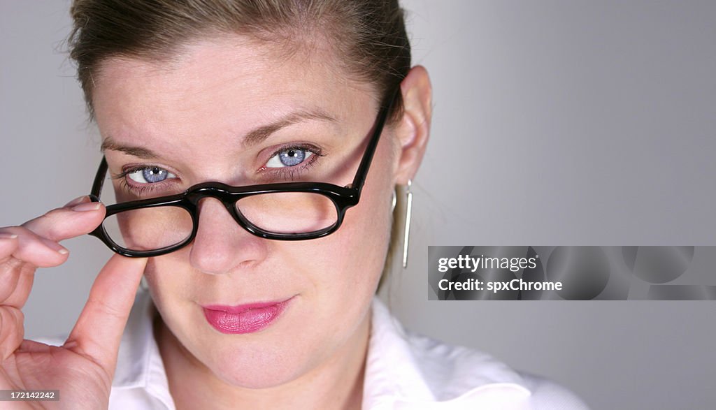 Look Over Spectacles Looking Over Glasses High-Res Stock Photo - Getty Images