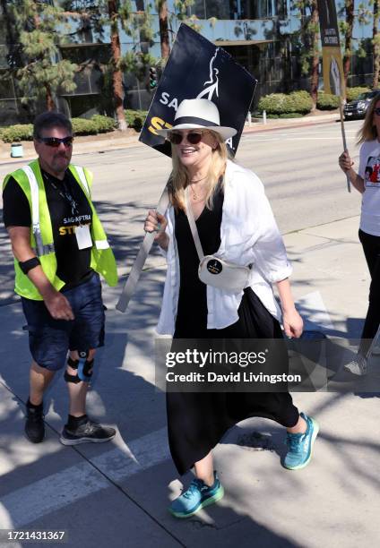 Kristen Johnston joins the picket line outside Warner Bros. Studios on October 06, 2023 in Burbank, California. The WGA has reached a deal with...