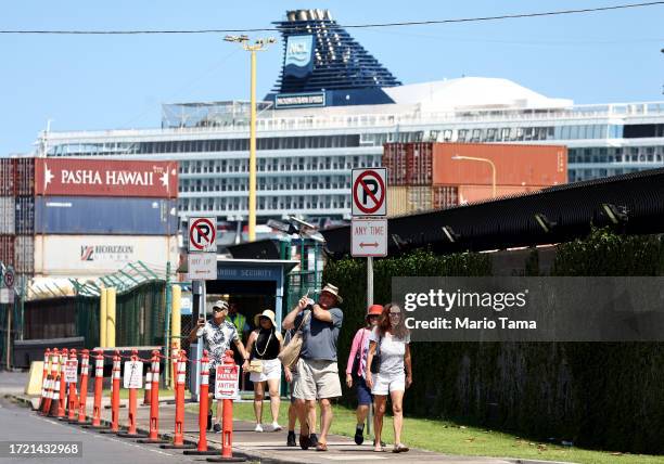 Tourists depart the Norwegian Spirit cruise ship , moored at Kahului Harbor in Maui during a tourism visit, on October 06, 2023 in Kahului, Hawaii....