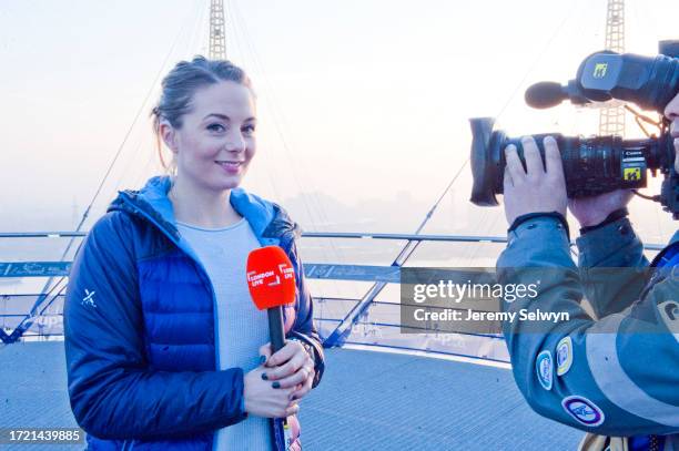 Video Journalist Alex Beard Live On The Roof Of The O2 Arena In London, England..Alex Beard Made History This Morning When She Became The First...