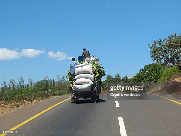 hauling bananas - african lorry stock pictures, royalty-free photos & images