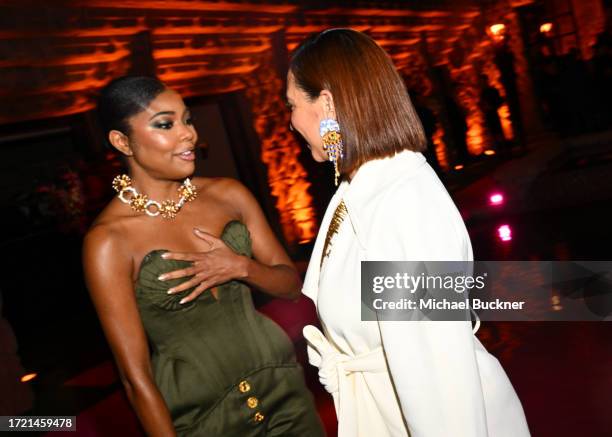 Gabrielle Union and Emily V. Gordon at the Schiaparelli and Neiman Marcus Cocktail Event at the John Sowden House on October 12, 2023 in Los Angeles,...