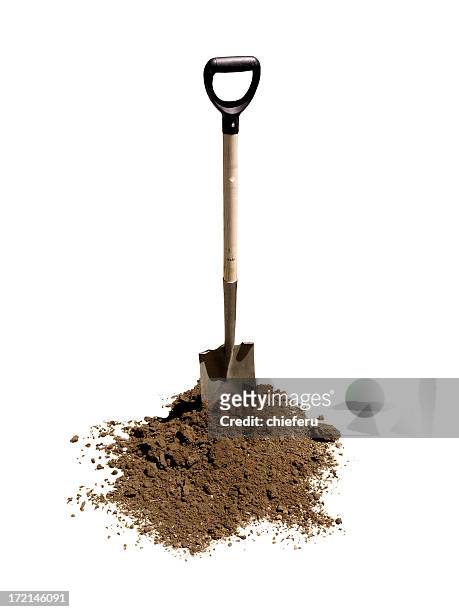 shovel in heap of dirt - digging stockfoto's en -beelden