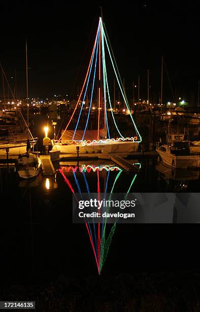 sailboat decorated with christmas lights - sailing ship night stock pictures, royalty-free photos & images