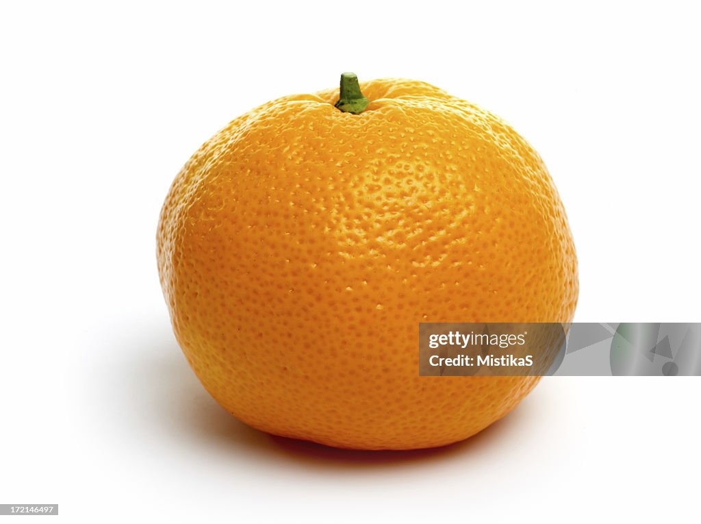 One single tangerine isolated on a white background