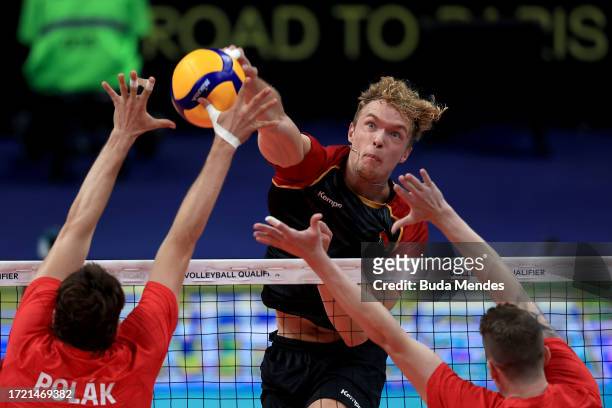 Anton Brehme of Germany jumps to spike the ball during the men's Olympic qualifying tournament 2023 volleyball match between Germany and Czech...